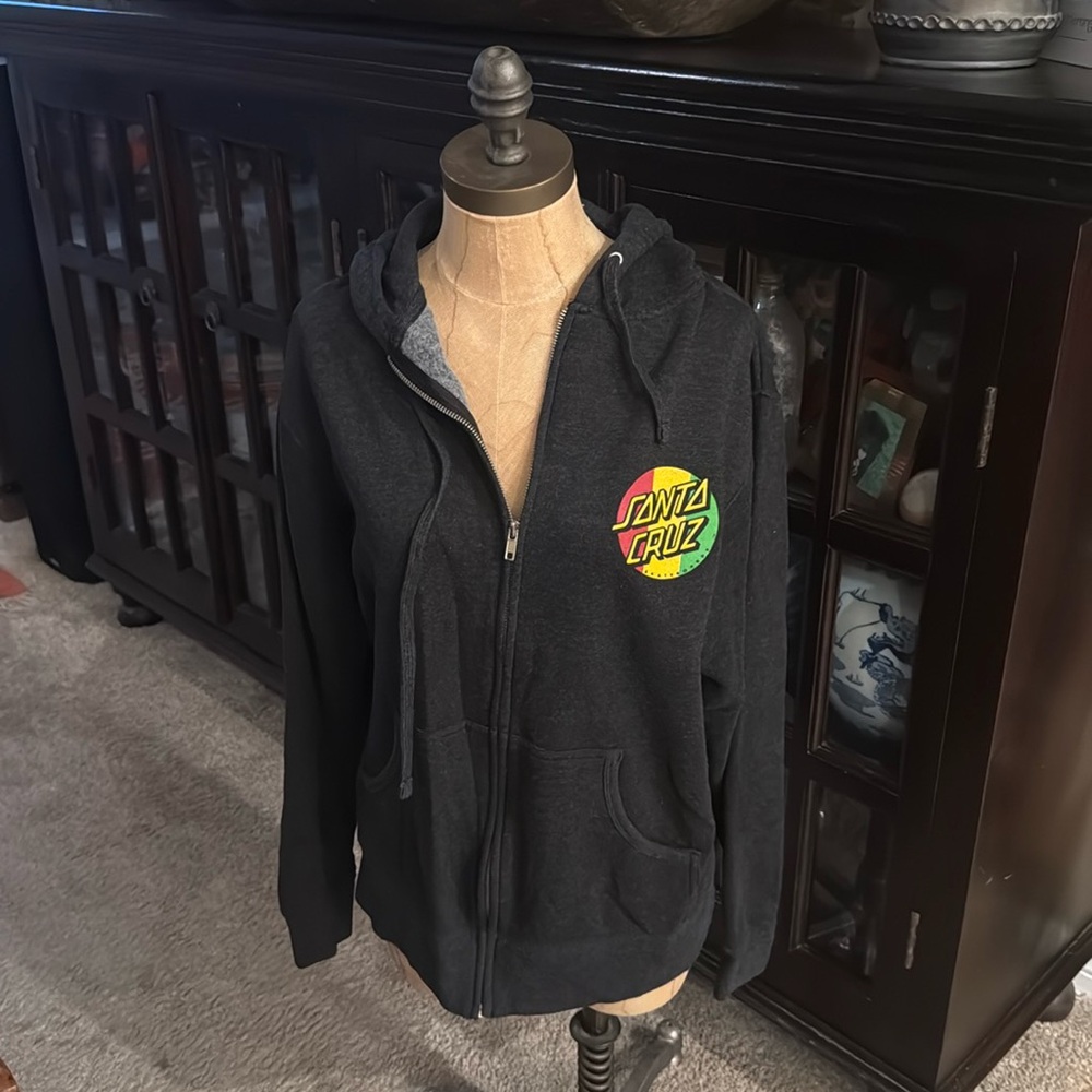 Size medium an original Santa Cruz Skateboard dark grey zip up hoodie